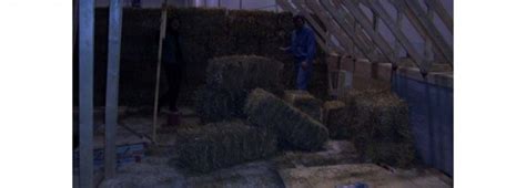 Straw Bale Stacking Harvest Homes