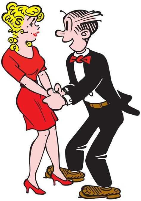 A Man In A Tuxedo Dancing With A Woman Wearing A Red Dress And Bow Tie