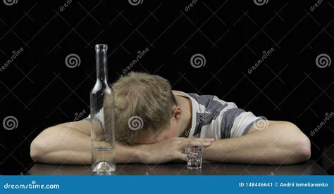 depressed drunk man sleeping alone in a dark room concept of alcoholism stock image image of