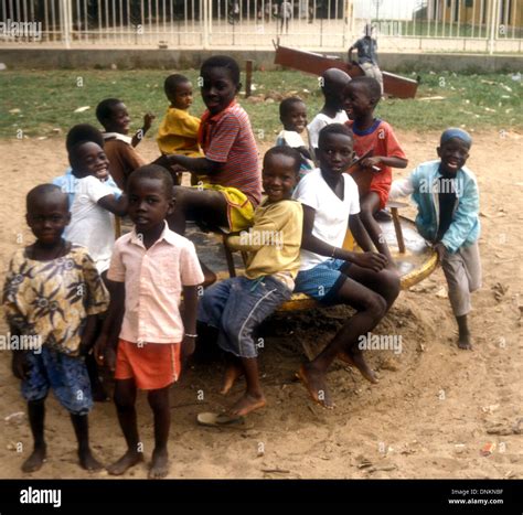 African Children Playing On A Round About Stock Photo Alamy