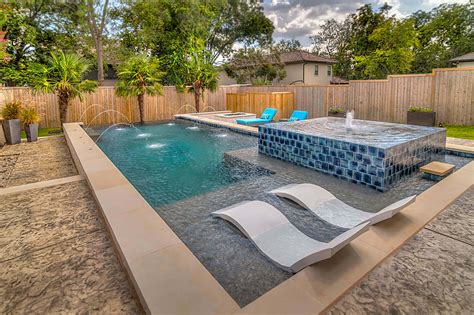 A backyard pool is a great place to cool off during the summer, relax next to the comforting sound of water and host a party with friends. Water Features That Perfectly Complement a Modern ...