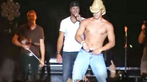 Luke Bryan And Shirtless Fan Have Dance Off During 2012 Concert Country