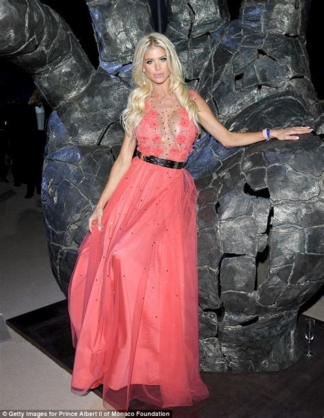missnews victoria silvstedt 43 puts on an eye popping display in a deeply plunging hot pink