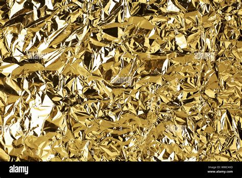 Crumpled Golden Foil Shining Texture Background Bright Shiny Gold