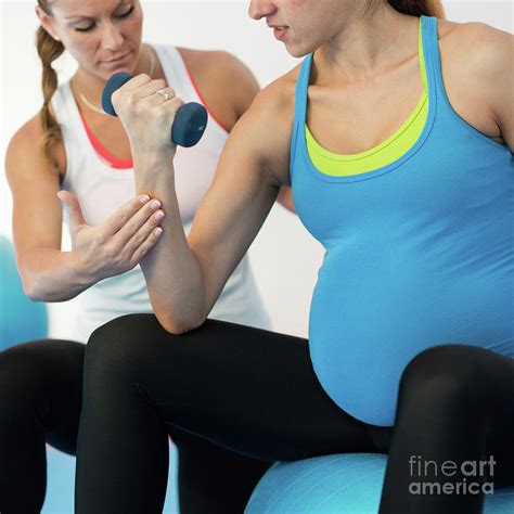 Pregnant Woman Exercising Photograph By Microgen Imagesscience Photo