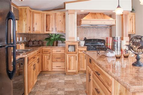 Hickory's grain is usually straight but can be irregular and wavy at times. Hickory Cabinets for Traditional and Rustic Look Kitchen ...