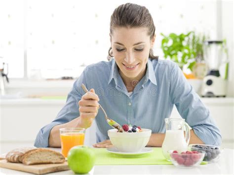 Smiling Woman Having Breakfast At Home Stock Image Image Of Milk