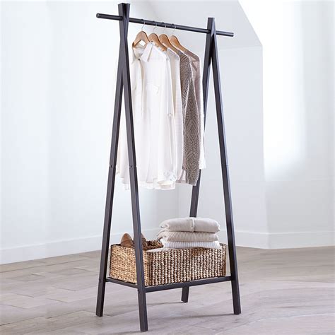 This Sleek Metal Garment Rack Is Perfect For Small Spaces Or Rooms With