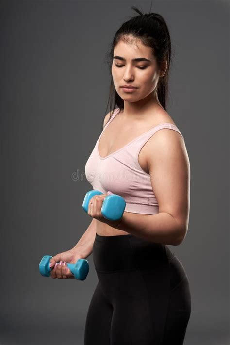 Plus Size Woman Doing Fitness Exercises With Dumbbells Stock Image