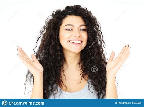 Cheerful Positive Young Mixed Race Female With Brunette Curly Hair