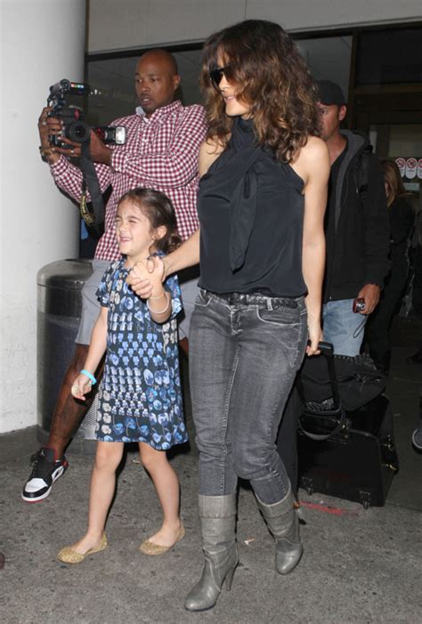 She likes to go to fashion week with her parents and wears gucci as if it's no big deal. Salma Hayek: Airport Arrival With Valentina | Celeb Baby ...