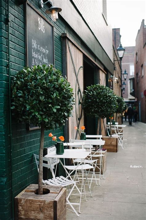 A few days later, lyn's mother told her to spend her evening sorting out and packing her belongings. tables and chairs in front of coffee shop | Cafe exterior ...