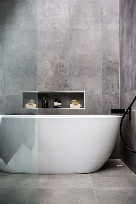 Grey and white bathrooms look smart, clean, stylish, and provide a calming backdrop in which we can relax our mind, body and soul. Contemporary Bathroom Tile Trends — RenoGuide - Australian ...