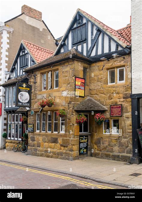 The Fleece An Historic Stone And Timber Public House Opposite The Town