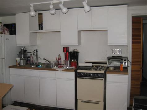 Use masking tape to visualize spacing. Sweet Tea off the G: DIY Kitchen Cabinet Remake