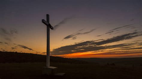 Cross On The Hill At Sunset Zoom Out Stock Video Footage Storyblocks