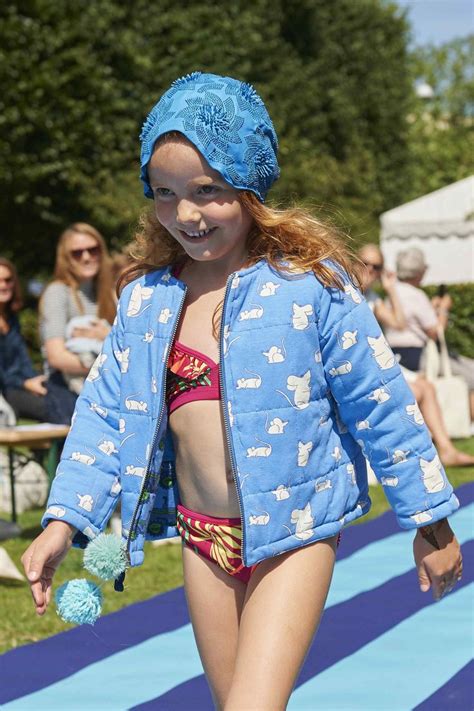 Top 30 best models of kids' leisure and gymnastics swimwear for girls and beach shorts for boys.summer children's fashion show. Jacket by Smafolk, bikini by Colour Kids at the CIFF Kids ...