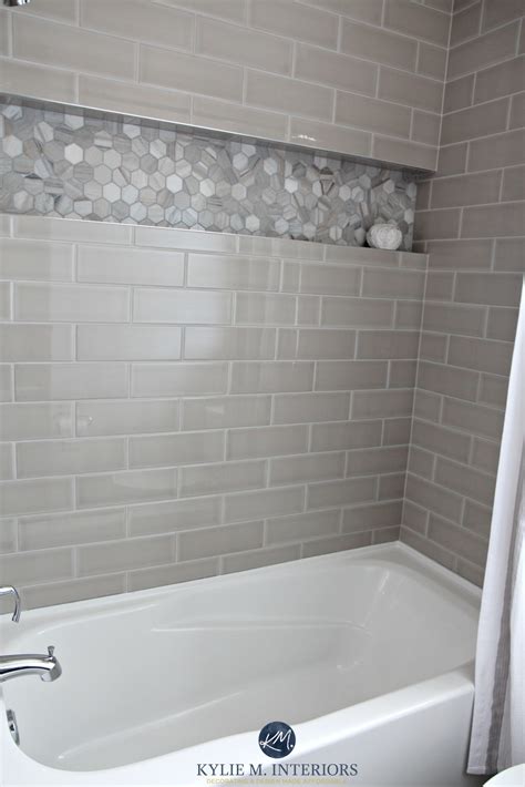 Bathroom With Bathtub And Gray Subway Tile Shower Surround With Niche Or Alcove In Hexagon