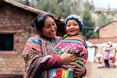 Peruvian Mom With Her Child by Stocksy Contributor Santi Nuñez