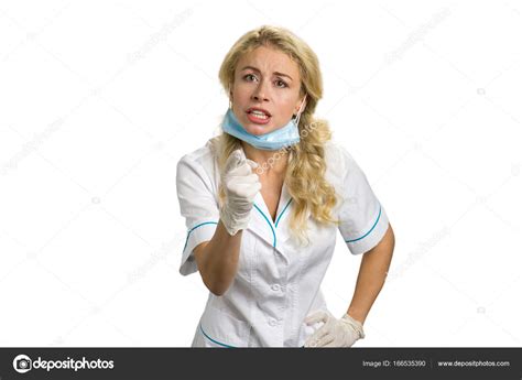 Portrait Of Angry Female Doctor Or Nurse — Stock Photo © Denisfilm