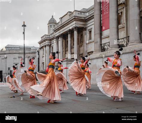 The beautiful movement of traditional chinese dancers in London Stock