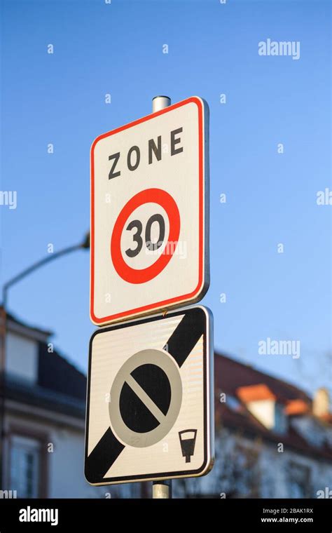 Zone 30 Kilometers Per Hour And End Of Parking Zone Street Sign With