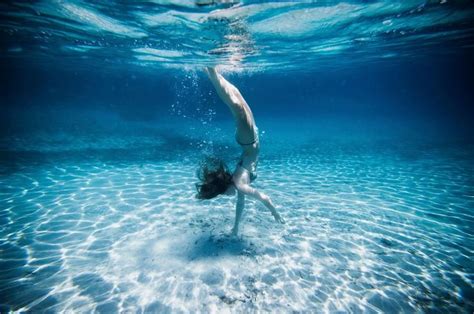 Underwater View Of Woman Swimming In Ocean By Gable Denims On Px Swimming Senior Pictures