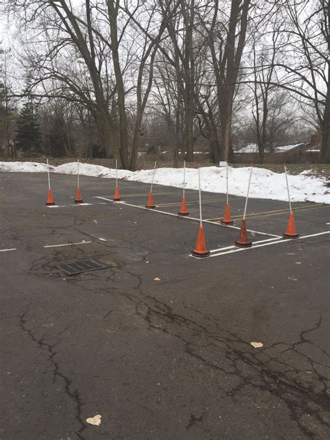 Combined with the cone signs, the 36 cones stand out. How To's Wiki 88: how to parallel park with cones step by step