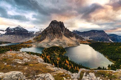Mount Assiniboine With Lake On Nublet Peak In Autumn Forest On Sunset