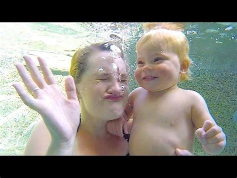 Toddler + dog + bubbles = win. CUTE TODDLER SMILING UNDERWATER! - YouTube