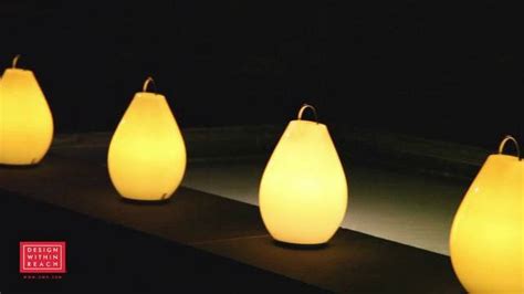 You can also use it for light while it sits upon its charging station. Luau Portable LED Lamp | Led lamp design, Portable led ...