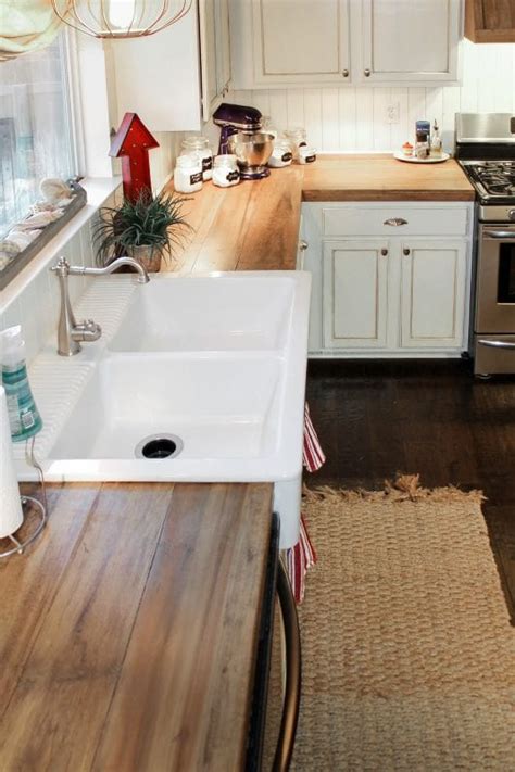 Any time we have a sink or countertops where there is potential for water or spills we use an exterior grade poplar or spruce ply, our supplier carries it for laminate work, it has a sanded face. Remodelaholic | 10 Inexpensive but Amazing DIY Countertop ...