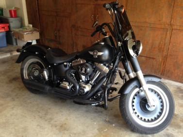 This black primed fender and bracket is ready to paint. Slim front fender on a FB Lo? - Harley Davidson Forums