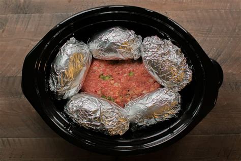 After you give the potatoes a good scrub down, make sure to dry. Slow Cooker Meatloaf and Baked Potatoes - The Magical Slow ...