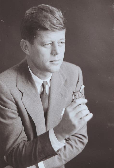 Portrait Of John F Kennedy Three Quarter Profile Holding Eyeglasses