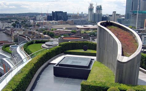 It was designed by skidmore, owings and merrill and is being developed by ballymore, a property development company. New Providence Wharf in London - green ovals | ZinCo Green ...