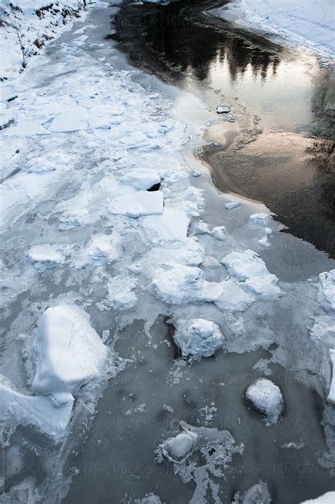 Frozen River In Winter By Stocksy Contributor Robert Kohlhuber