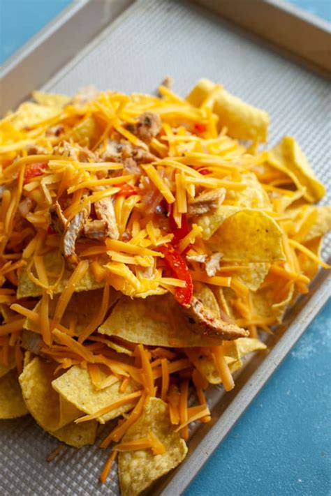 Drizzle olive oil into a skillet over medium heat. Chicken Fajita Nachos with Chipotle Lime Marinade ~ Macheesmo