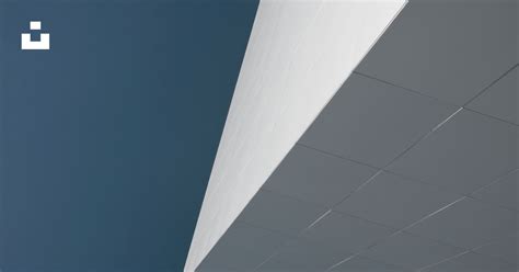White Concrete Building Under Blue Sky During Daytime Photo Free Grey