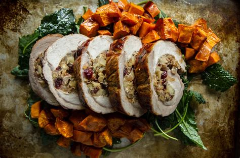 1 large pork tenderloin (about 14 ounces), 3 tablespoons olive oil, divided, 2 tablespoons whole grain dijon mustard, 2 teaspoons fennel seeds, 1 large onion, sliced, 2 medium granny smith apples, peeled, cored, sliced 1/4 inch thick, 1/2 cup dry white wine or apple cider. apple bourbon pork tenderloin side dishes