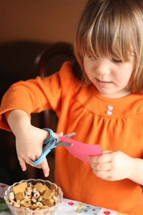 For a neat tear, fold the card both ways along a line to create a straight edge. Making Paper Flowers for Homemade Greeting Cards