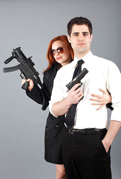 Couples With Guns Stock Photos Pictures And Royalty Free Images Istock
