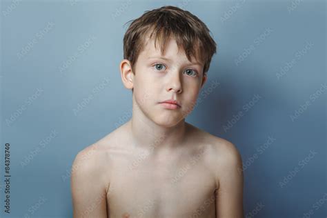 A Boy Of 10 Years Of European Appearance Naked Torso Portrait On Stock