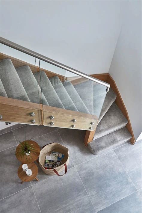 Whether grand and sweeping, rendered in wood, or a minimalist arrangment of metal and glass, the modern staircase is an example of literally elevated design. Contemporary Glass Staircases | Jarrods | Stairway design ...