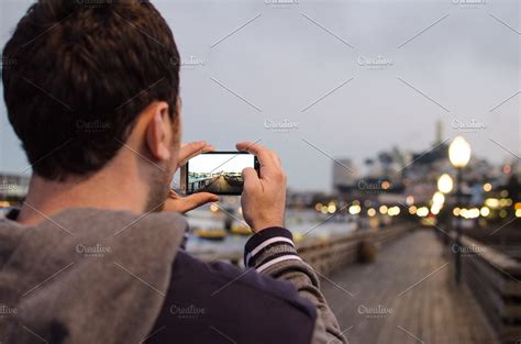 Man Taking Photo With Phone High Quality Technology Stock Photos