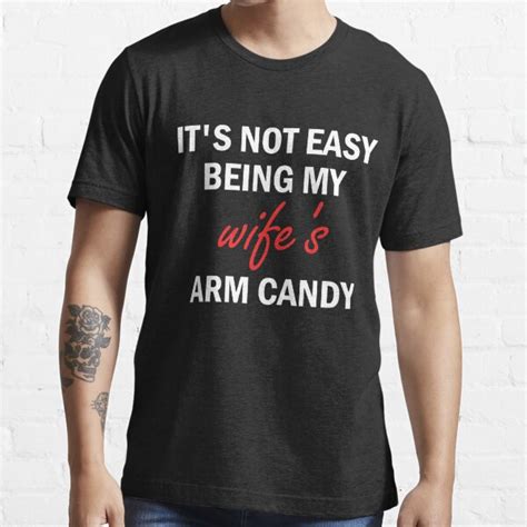 it s not easy being my wife s arm candy t shirt for sale by bataha redbubble its not easy