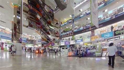 24 785,12 kč bez dph. BANGKOK - APR 14: Customer Walking Inside Of MBK Shopping ...