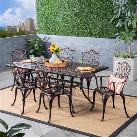 Here, your favorite looks cost less than you thought possible. Clayton Outdoor 7 Piece Cast Aluminum Rectangular-Table ...