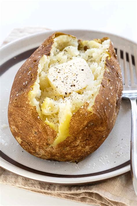 Pierce potatoes all over with a fork. How to Bake a Potato (3 Ways!) - Jessica Gavin