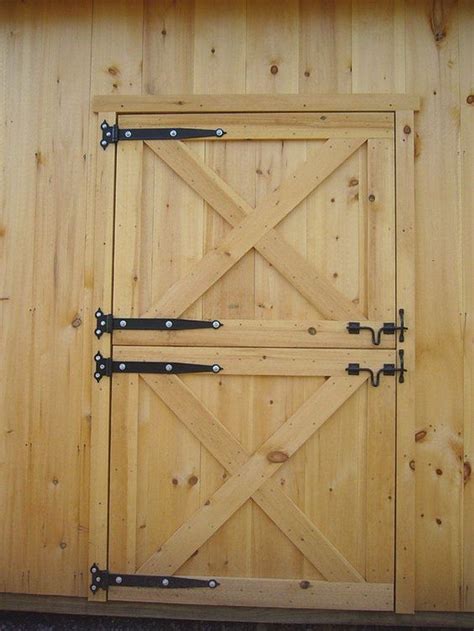 We drilled three holes in each flat metal bar, one at the top for attaching the roller wheel, and two at the bottom for attaching the door. How to build a Dutch barn door | DIY projects for everyone!